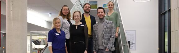 Vertreter von Agaplesion und BKK24 stehen zusammen